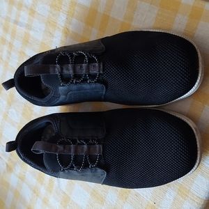 Size 10 black Skechers slip ons